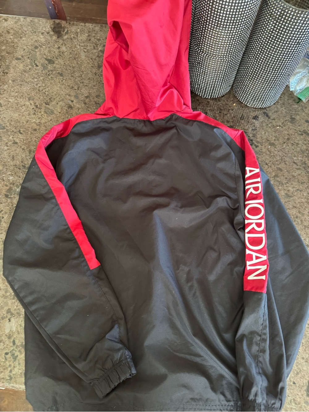 Jordan Black and Red Hooded Windbreaker with Air Jordan Sleeve Logo